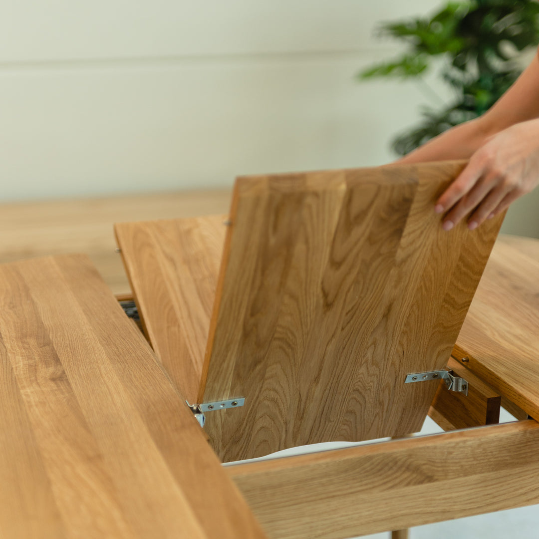 Table à manger ronde extensible en bois coloris chêne nordique